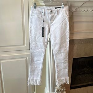 White jeans frayed bottoms